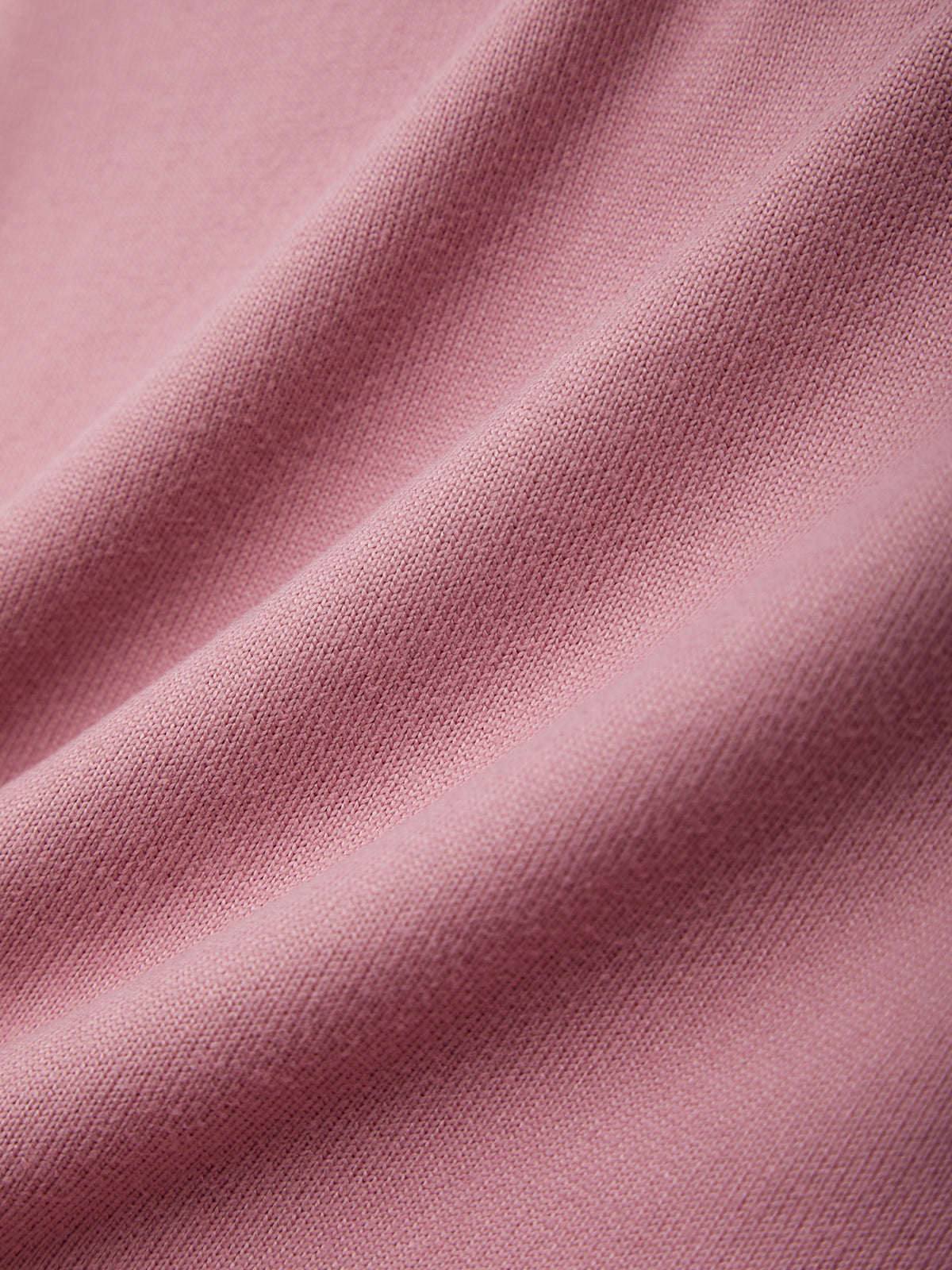 Close-up of pink fabric with visible texture