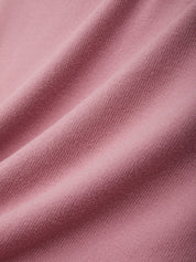 Close-up of pink fabric with visible texture