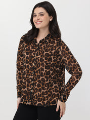 Woman wearing a leopard print shirt on a white background