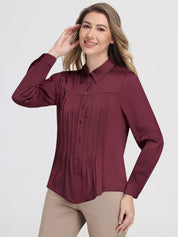 Woman wearing a burgundy shirt on a white background