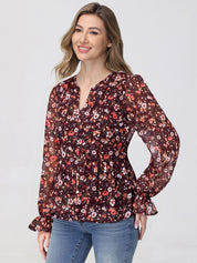 Woman wearing a floral blouse with long sleeves on a white background