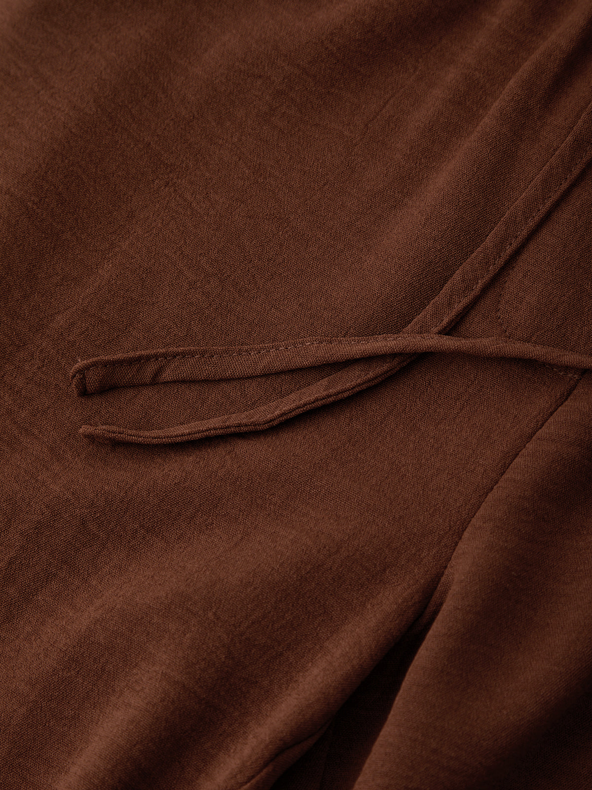 Close-up of a brown fabric texture