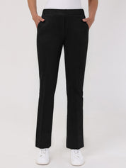 Black pants worn by a person on a white background