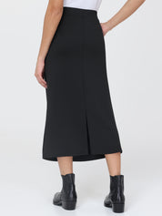 Black skirt worn by a person on a white background
