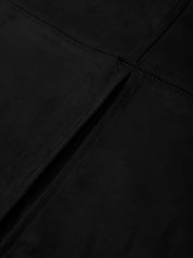 Close-up of black fabric with a visible seam