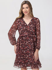 Woman wearing a floral dress on a white background