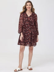 Woman wearing a floral dress on a white background