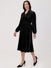 Woman wearing a black dress on a white background