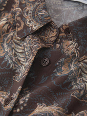 Close-up of a brown patterned shirt with buttons