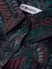Close-up of a patterned shirt with a '89thMadison' label.