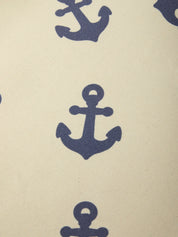Pattern of blue anchors on a beige background