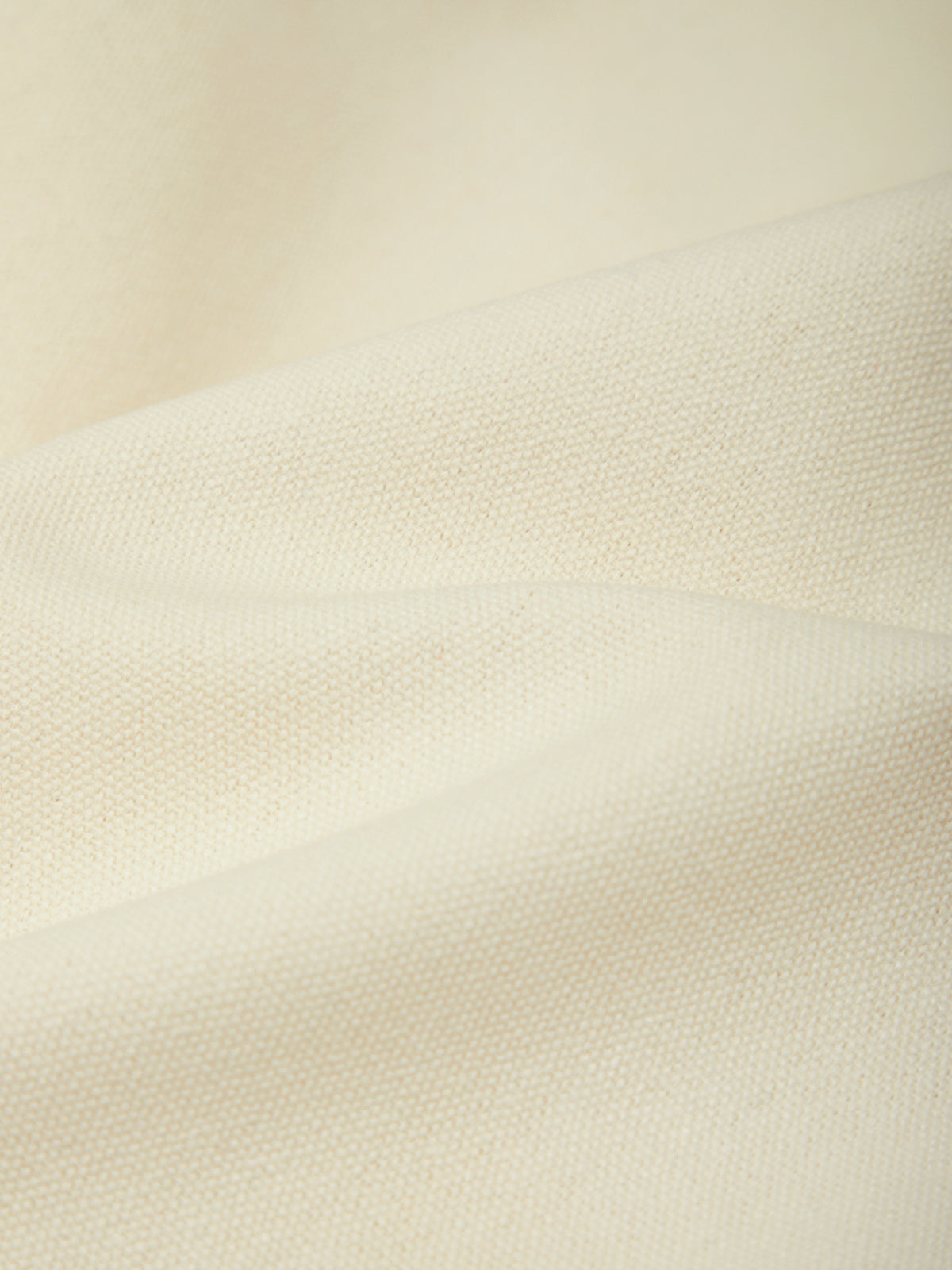 Close-up of beige fabric texture