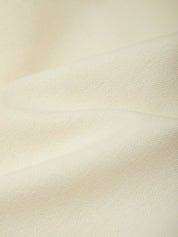 Close-up of beige fabric texture