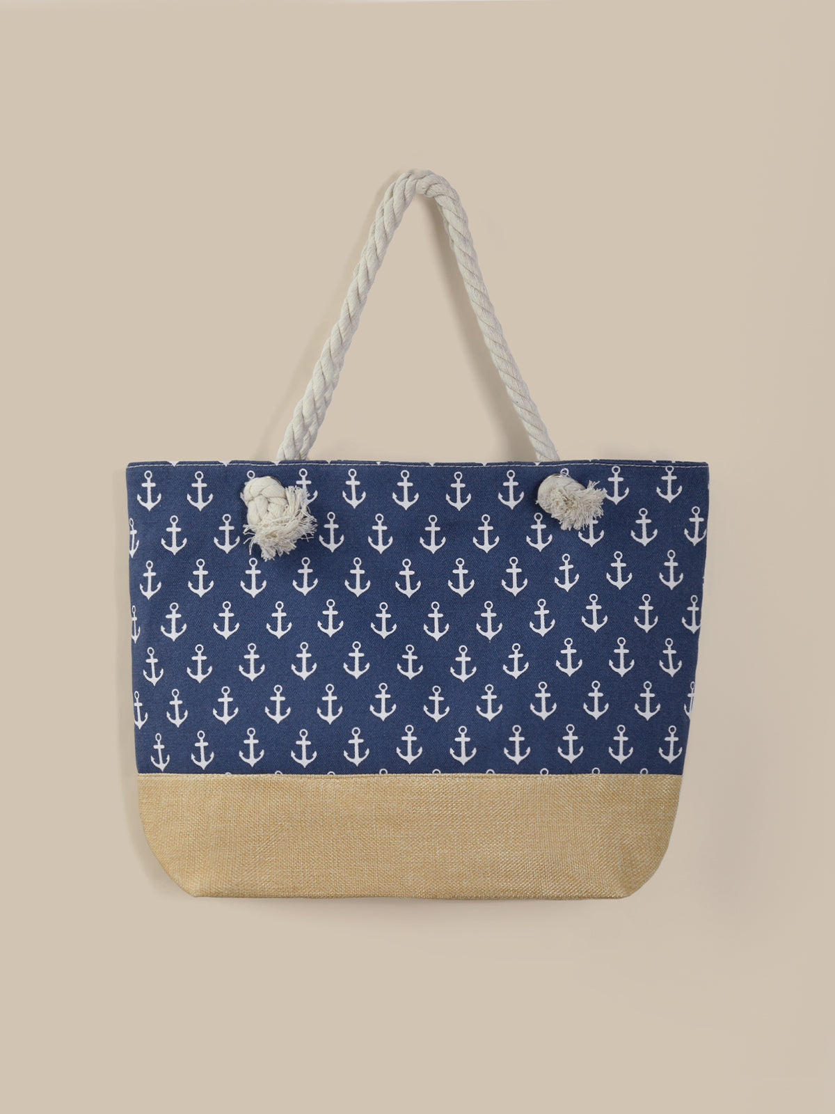 Tote bag with anchor pattern on a blue background and beige bottom section.