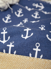 Navy blue fabric with white anchor pattern