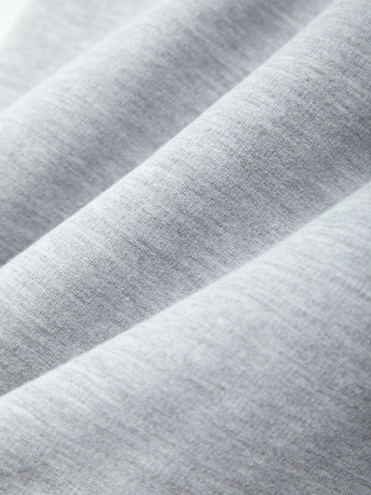 Close-up of gray fabric with a subtle pattern