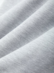 Close-up of gray fabric with a subtle pattern