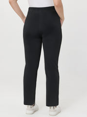 Black waffle pants worn by a person on a white background