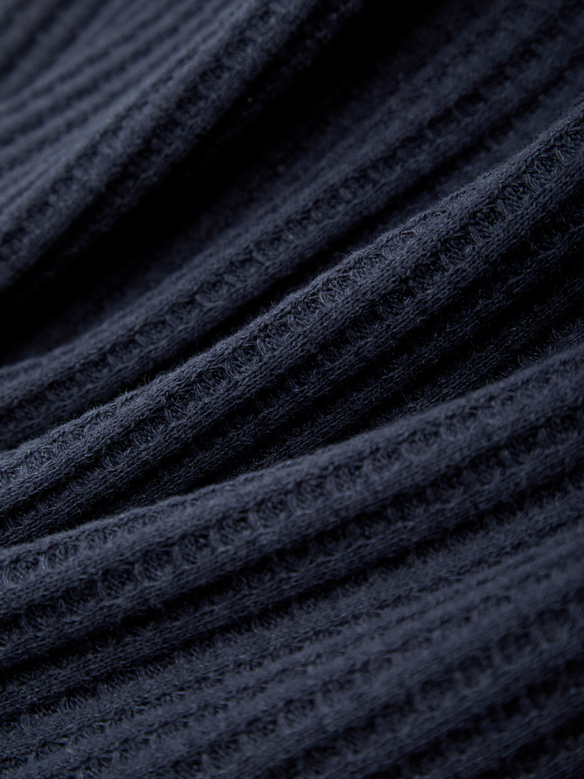 Close-up of dark blue textured fabric