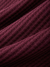 Close-up of textured purple fabric