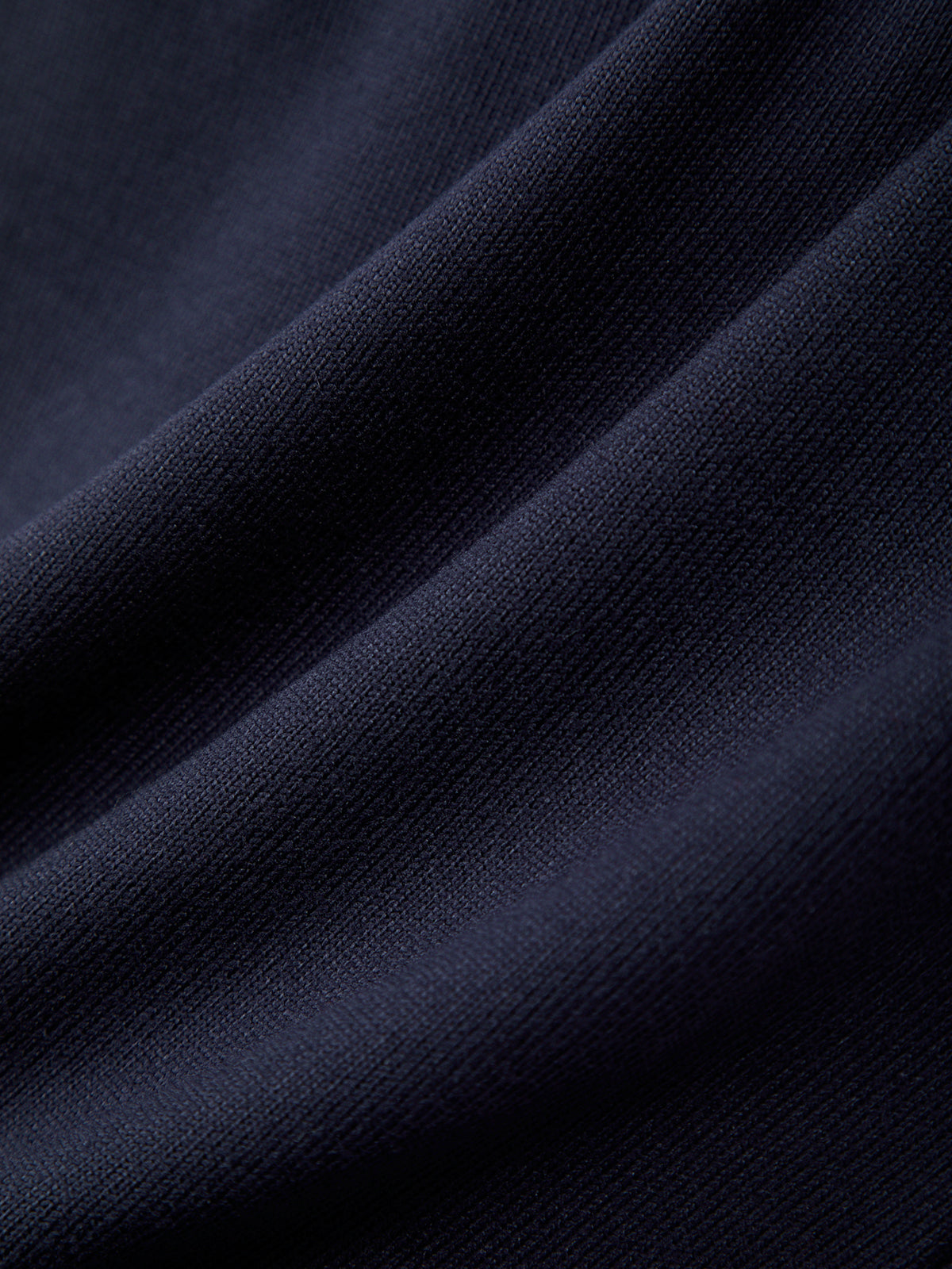 Close-up of dark blue fabric texture