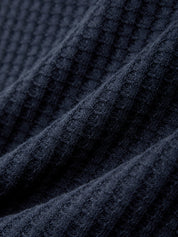 Close-up of textured navy fabric