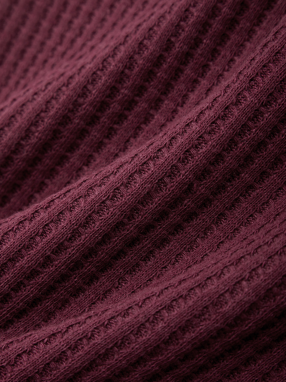 Close-up of textured purple fabric