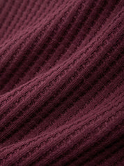 Close-up of textured purple fabric