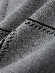 Close-up of textured fabric with stitching detail