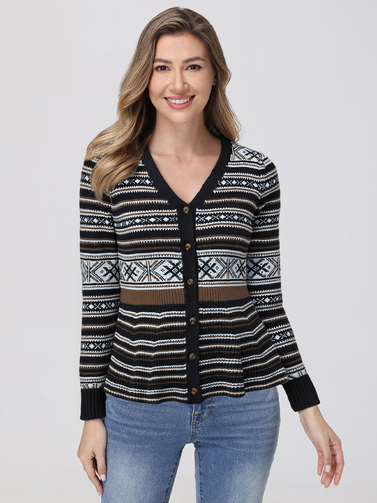 Woman wearing a black patterned cardigan on a white background