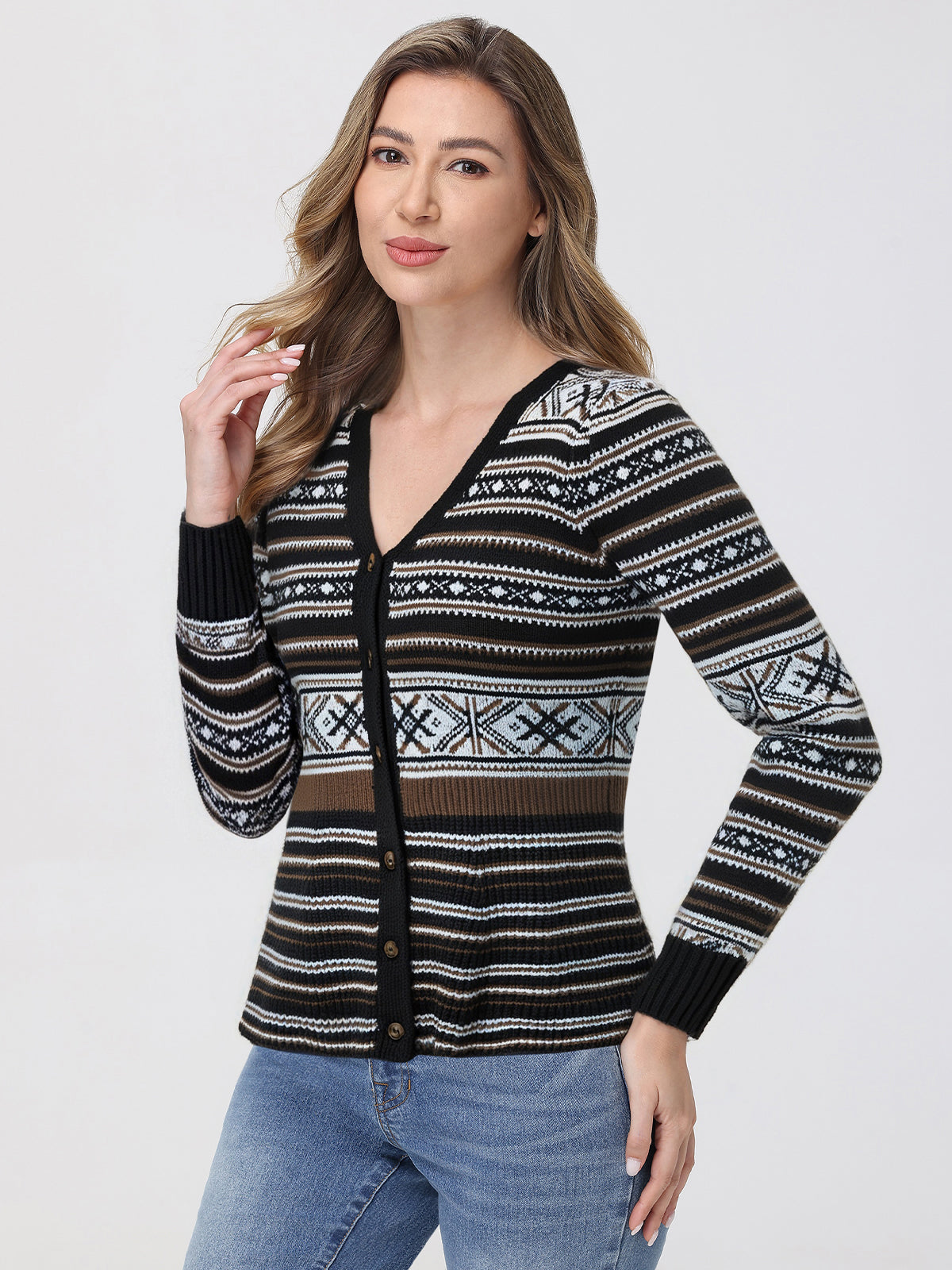 Woman wearing a patterned cardigan on a white background