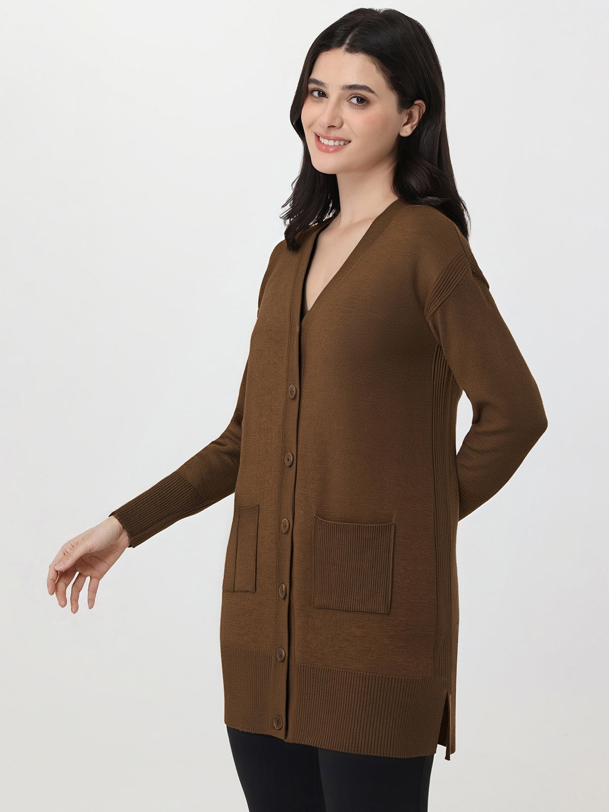 Woman wearing a brown cardigan on a white background