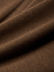 Close-up of brown fabric with a textured surface
