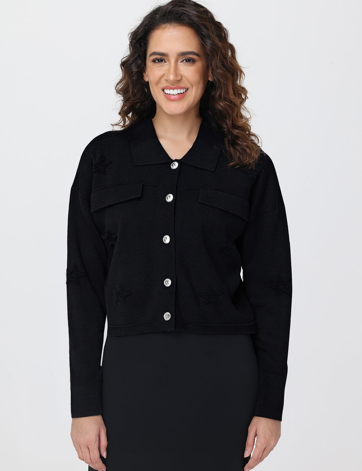 Woman wearing a black cardigan on a white background