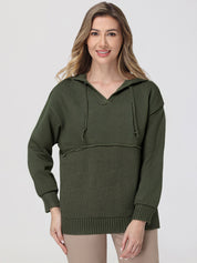 Woman wearing a green hooded sweater with a textured pattern on a white background