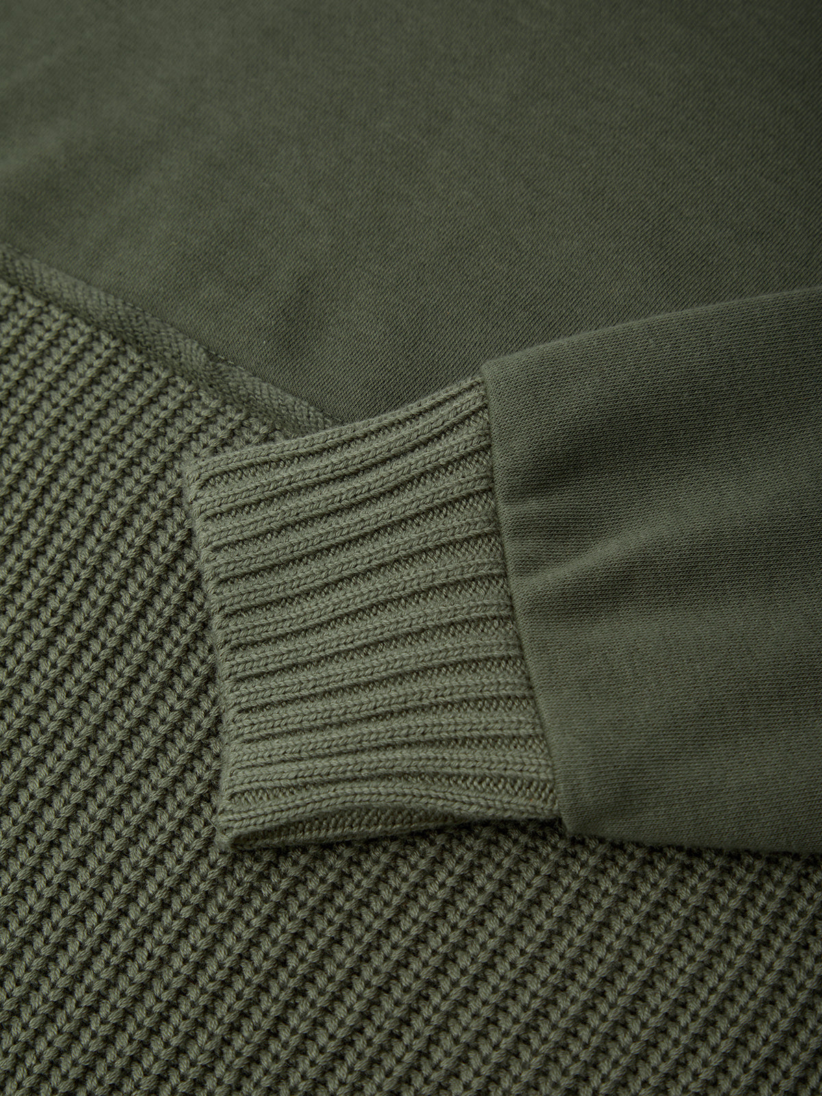 Close-up of a green fabric with ribbed texture