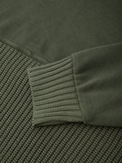Close-up of a green fabric with ribbed texture