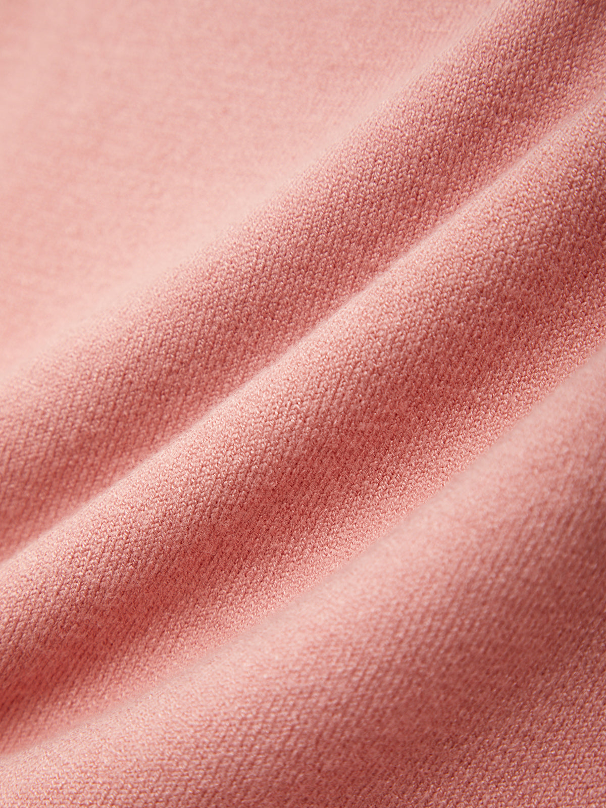 Close-up of pink fabric with visible texture