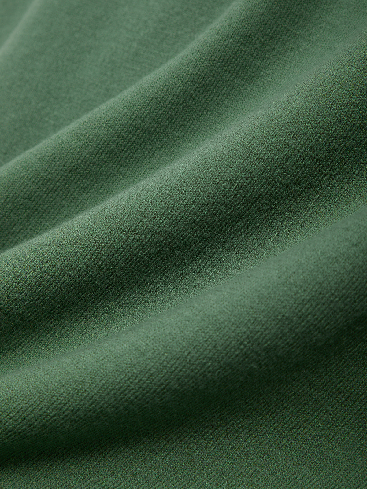 Close-up of green fabric with visible texture