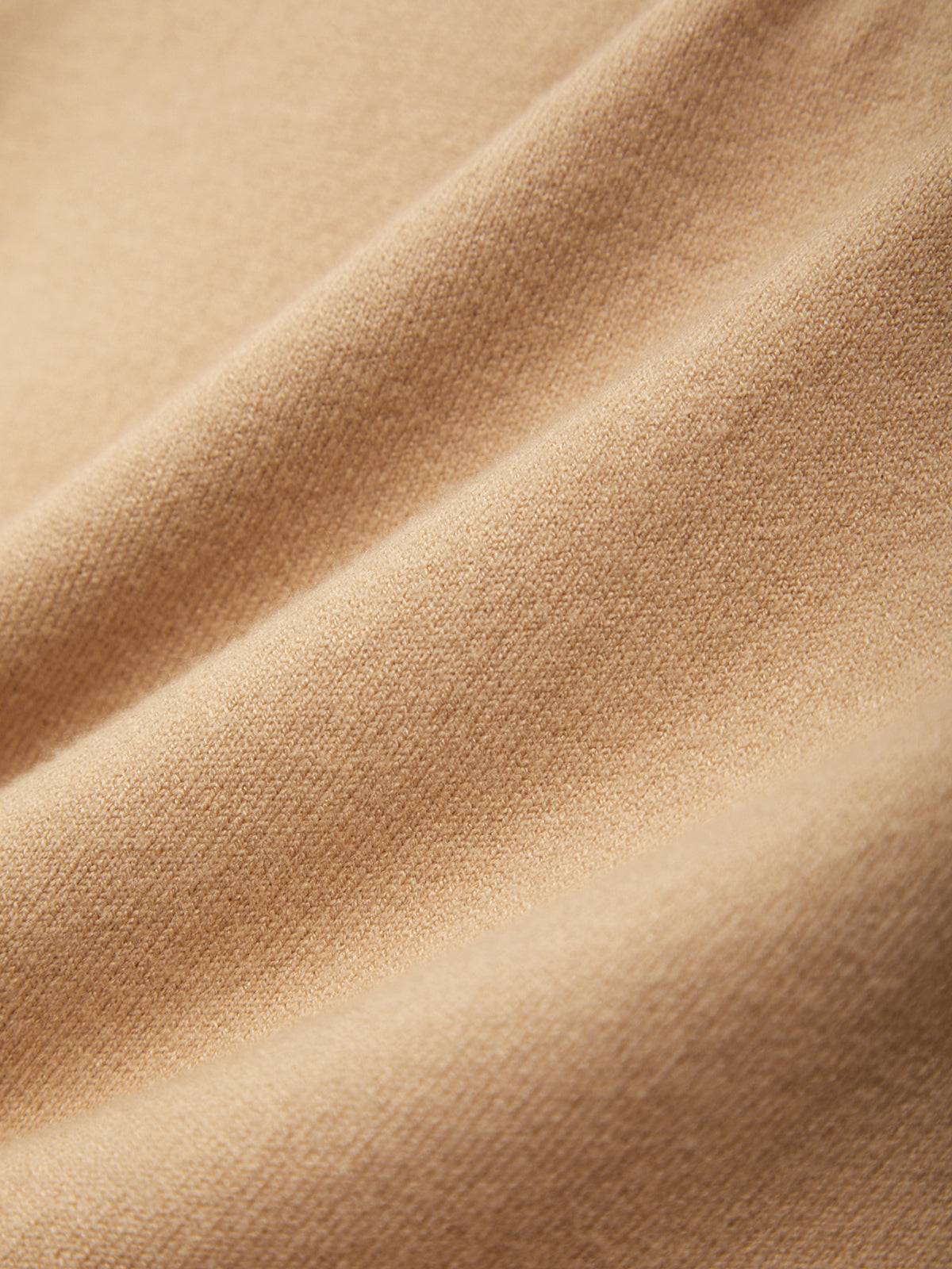 Close-up of beige fabric texture