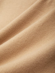 Close-up of beige fabric texture