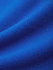Close-up of blue fabric with a textured pattern