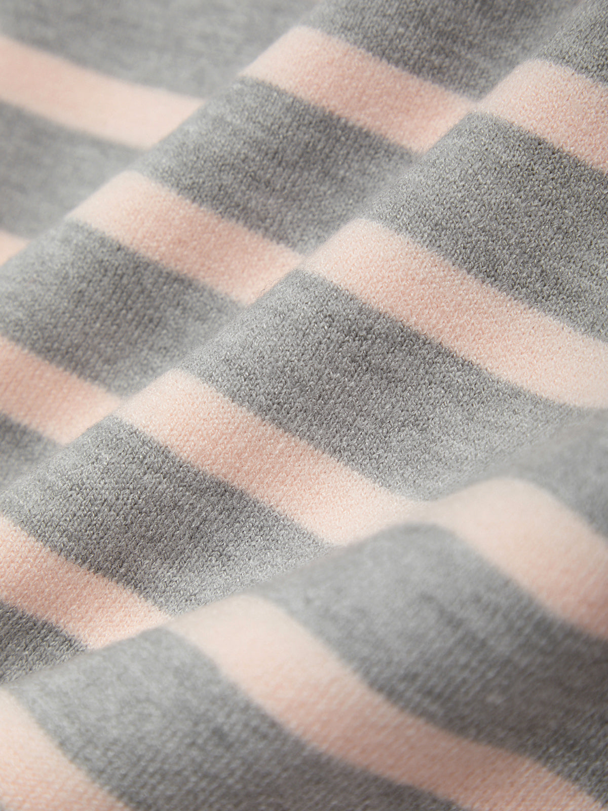 Close-up of gray and pink striped fabric