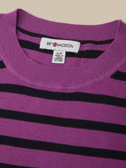 Close-up of a purple knit sweater with horizontal black stripes, showing a white neck label that reads 89th & MADISON.