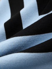 Close-up of black and light blue striped fabric