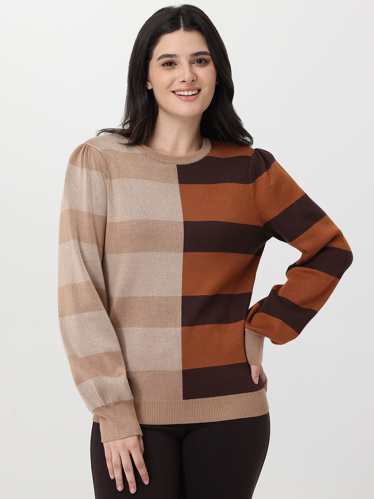 Woman wearing a checkered sweater with brown and beige colors on a white background