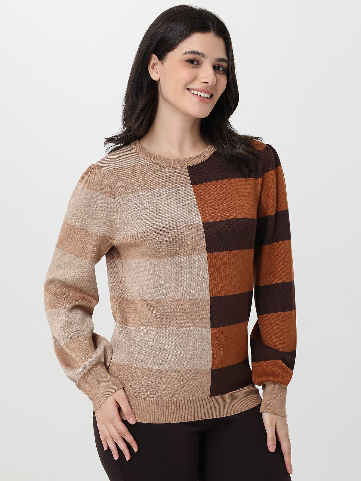 Woman wearing a checkered sweater with brown and beige colors on a white background