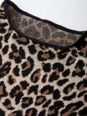 Close-up of a leopard print fabric with a black trim on a white background
