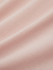 Close-up of pink fabric with a soft texture