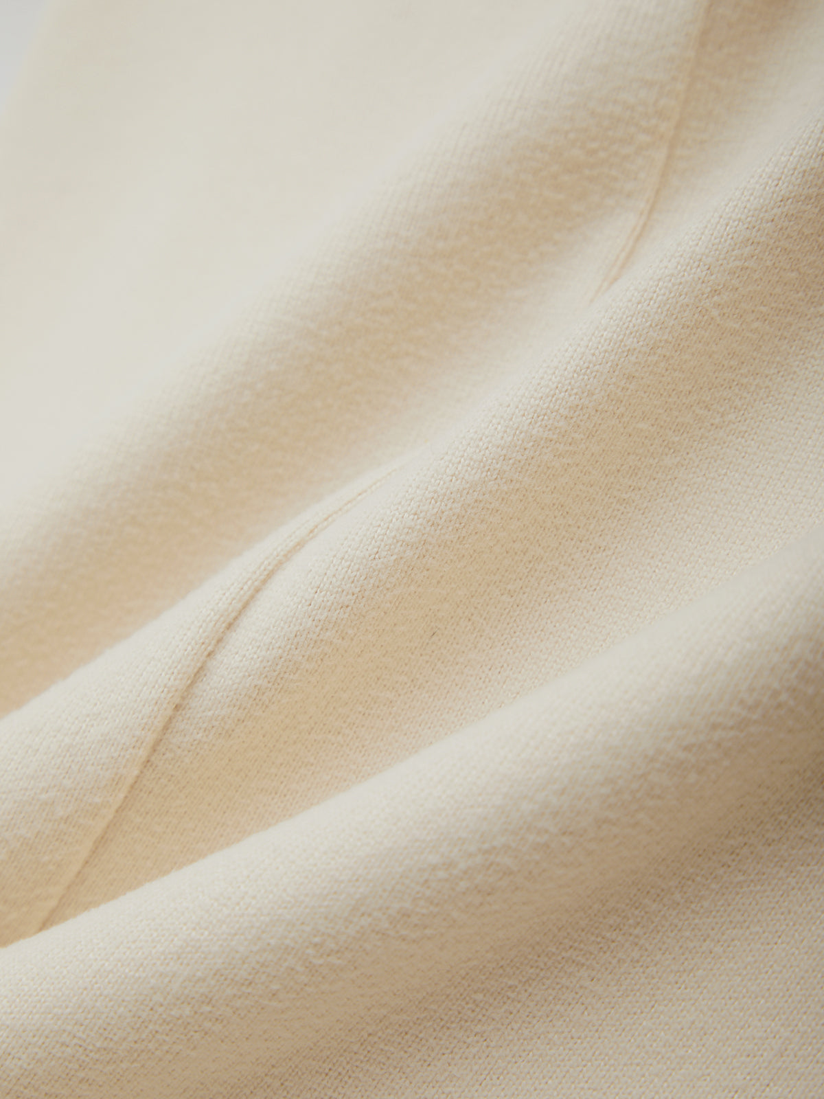 Close-up of beige fabric with a soft texture
